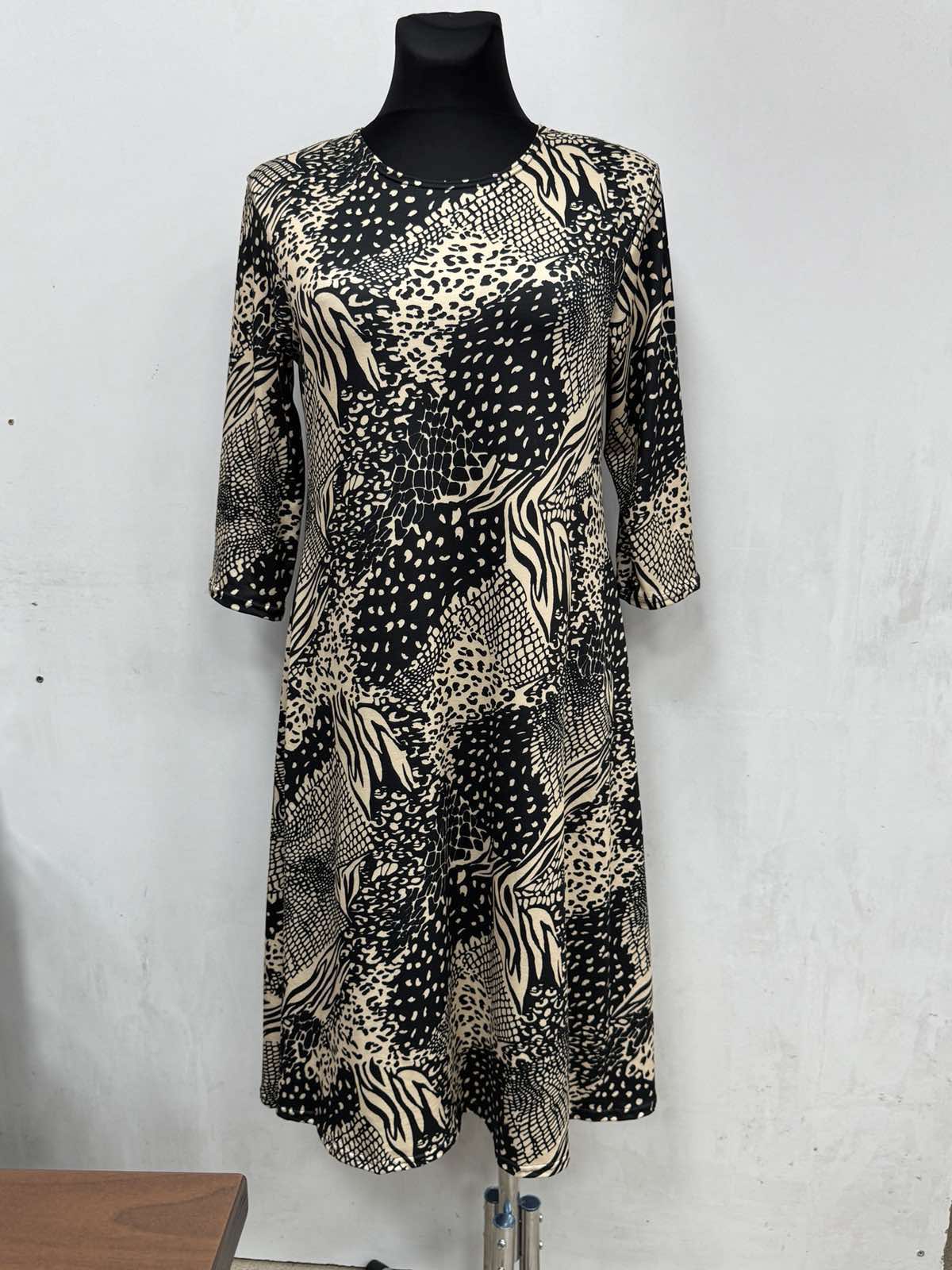 Sukienki Damskie polskie, Size 46-52, paczka 4szt,1kolor